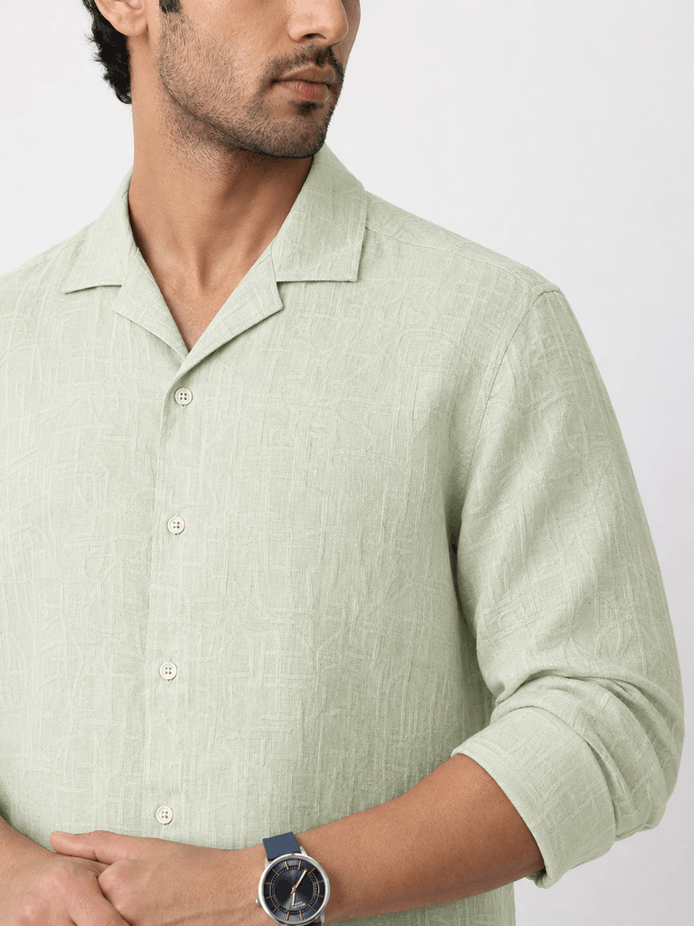Close up of lime green linen shirt fabric and collar