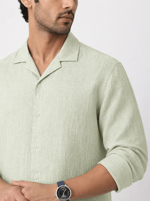 Close up of lime green linen shirt fabric and collar