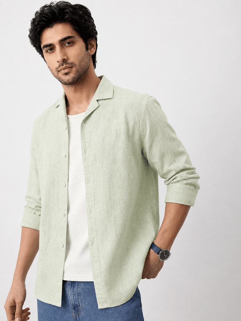 Angled view of lime green linen shirt