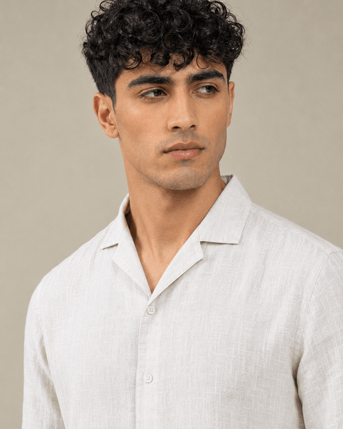 Close up of off white linen Cuban collar shirt fabric and collar