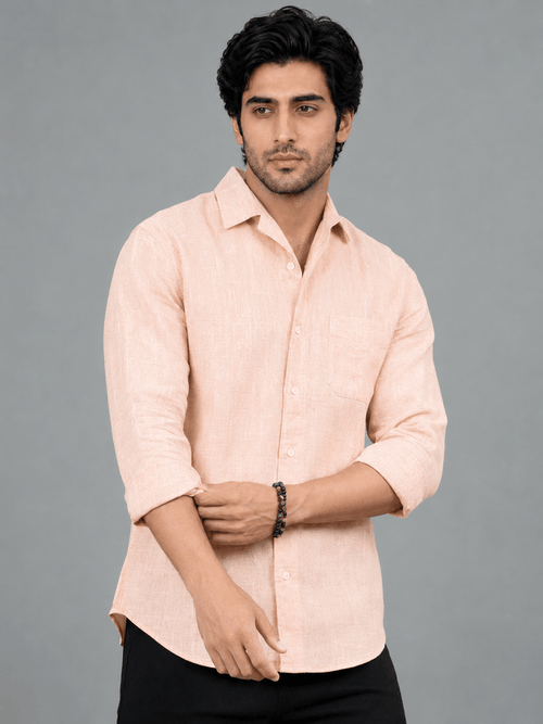 Angled view of peach linen shirt